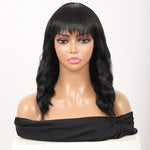 Short Synthetic Black Wig with Hair Bangs Short Wavy Curly Wig for Women -Natural Looking and Heat Resistant Full Head Hair Replacement Wig for Daily Wear or Costume Wig