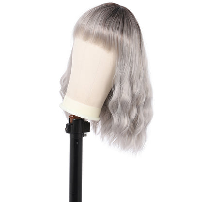Short Synthetic Silver gray Wig with Hair Bangs Short Wavy Curly Wig for Women -Natural Looking and Heat Resistant Full Head Hair Replacement Wig for Daily Wear or Costume Wig
